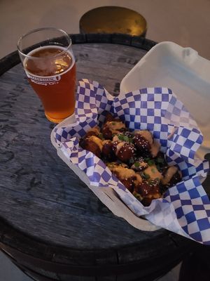 honny garlic Bangers and special addition bangin beer at Bangin' Vegan Eats in Charleston