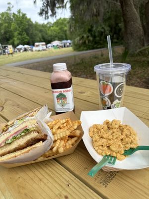 “Chikn sandwich” fries and mac-n-chz.  Everything was great and the employees were super amazing despite being swarmed by the eager crowd waiting to be served    at Bangin' Vegan Eats in Charleston