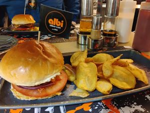 Vegan cheeze burger and pillowy fries 🍀 at Albi in Nerja