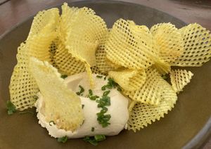 Home made potato chips with cashew feta  at Three Seven Two in Waiheke Island