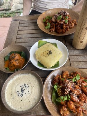 Orange chicken, mash potato, cashew gravy, tofu balls   at Peanuts in Hoi An