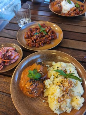 Mash, orange chicken, tomato 'meatballs' and kimchi at Peanuts in Hoi An