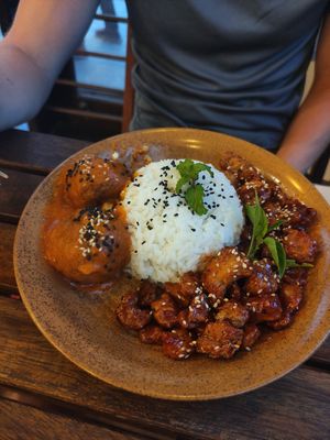 Rice, orange chicken and tomato tofu balls at Peanuts in Hoi An