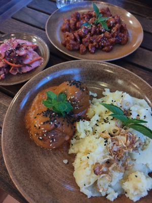 Mash, orange chicken, tomato 'meatballs' and kimchi at Peanuts in Hoi An