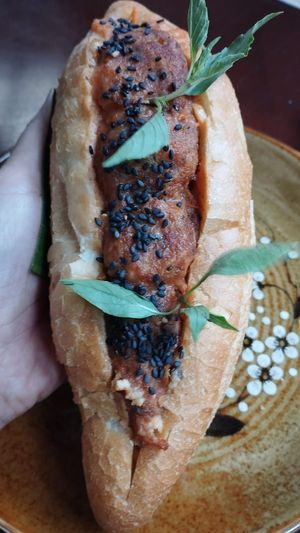 Gourmet Banh Mi with tomato sauce tofu balls. at Peanuts in Hoi An
