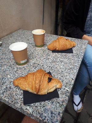 Sweet croissants with berry jam and coffee with soymilk at Il Pane Quotidiano Lungomare in Trieste