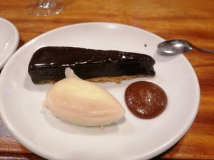 Chocolate - tarte with a pear-sorbet and a sauce of haselnut at Orburu Taberna in San Sebastian