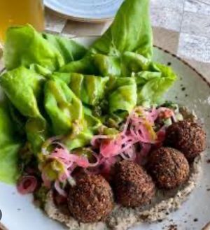 Falafel salad-delicious- don’t forget to ask for no yogurt  at The Lazy Goat in Greenville