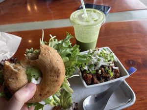 Couldn’t wait sorry but Blasted Vegan on gf bagel with chili and green smoothie !!   at Alua's Thrive Bar in Mount Shasta