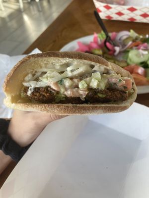 Falafel sandwich with veggies! Items have a symbol next to them on the menu to mark what is vegan and at least 1/3 of it is! 🙌🌱  at O'Falafel etc. in Salt Lake City