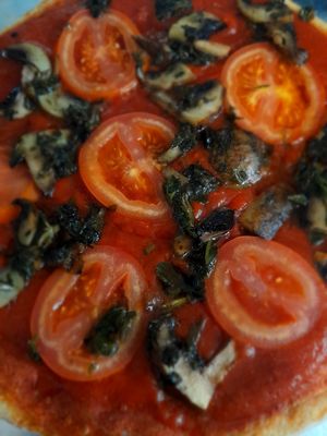 Santurce - sautéed mushrooms with Chimmi and fresh sliced tomatoes.  at Vegan Pizzeria in San Juan