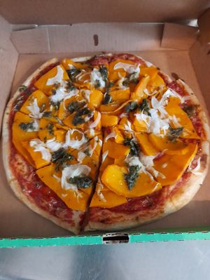 La Asada. Baked pumpkin with local Chimmi from our orchard and onions.  at Vegan Pizzeria in San Juan