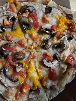 Custom pizza order at Vegan Pizzeria in San Juan