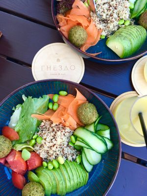 Vegan bowl with falafel: falafel, avocado, quinoa, carrots, edamame, tomatoes, cucumber, salad mix at Gnezdo in Tula