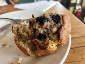 Vegan blueberry muffin (half eaten 😝)  at The Apron Cafe in Christchurch