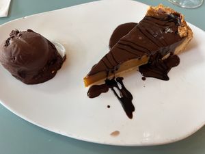 Pumpkin pie with chocolate sauce and chocolate ice cream   at Luleå in Alicante