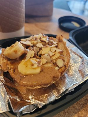 "Good Bread" cinnamon raisin bagel with almond butter, bananas, and almonds at Poet's Coffee in Cookeville