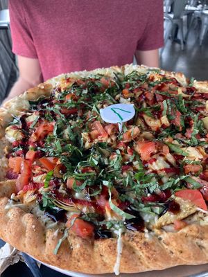 The vegan Goodfella pie. Loved the mix of vegan cheese and marinara, seitan “chick’n”, and fresh basil.  at The Pie in South Salt Lake