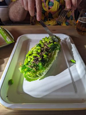 Kos, edamame and seaweed salad, plus my husband, who couldn't wait another second! at Umi in Tenby