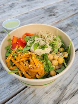 Chickpea quinoa arugula salad bowl at Zest in Traverse City