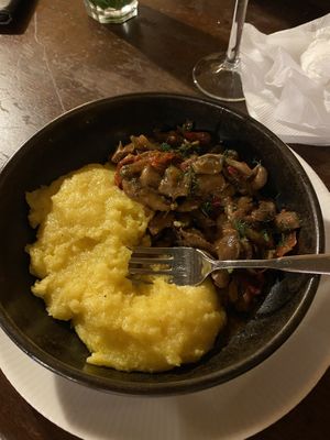 Mushroom stew and polenta  at Caru' cu Bere in Bucharest
