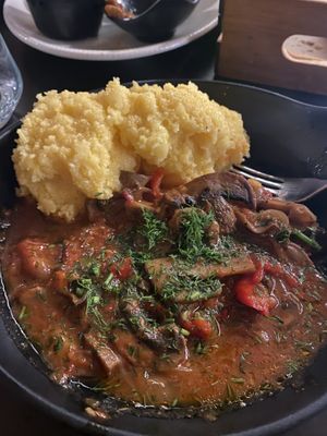 Mushroom stew with polenta  at Caru' cu Bere in Bucharest