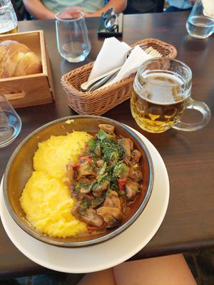Polenta with mushrooms at Caru' cu Bere in Bucharest