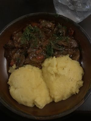 Mushroom stew with polentaa  at Caru' cu Bere in Bucharest