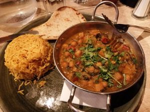 Vegan sweet potato, chickpea, and spinach curry with rice and naan bread at The Oak Tree Inn in Balmaha