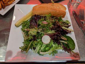 Grilled sausage sandwich with Beyond Meat bratwurst at Daily Planet in Burlington