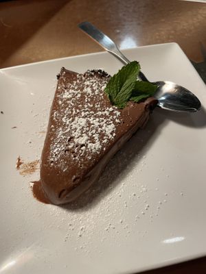 Mint chocolate cheesecake with Oreo crust   at Daily Planet in Burlington