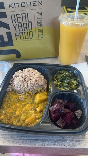 Vegan stew, rice and peas, beets, collard greens, mango juice!  at Jerk'D Caribbean Kitchen in Hackensack