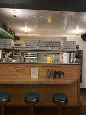 Pizza boxes to go  at Swan Dive in Rochester
