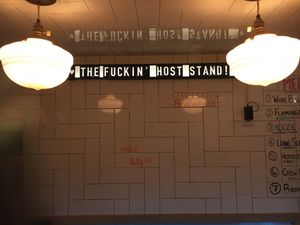 Sign on wall gives a sense of the ambience at Swan Dive in Rochester