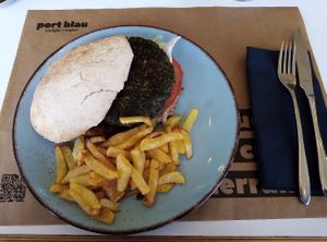 Vegan burger with fries. at Port Blau in Lestartit