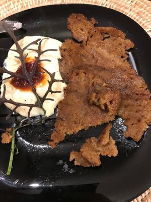 grilled seitan and a potato puree sauce.  at Espaço Vivo S Coop Galega in Redondela