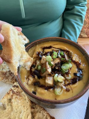 Sweet potato soup with tofu. Comes with locally made sourdough    at Steamy Buddha in Ellsworth