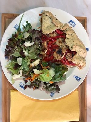 Roasted pepper, goat cheese and hazelnut tart with salad at Cantina Minúscula in Lisbon