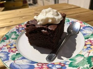 Chocolate cake with cream at Cantina Minúscula in Lisbon
