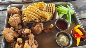 Buffalo cauliflower with pickled peppers, vegan ranch, waffle fries at Lost Forty Brewing in Little Rock