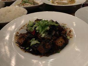 Eggplant and tofu, charred with burnt flavor. Tasteless.  at Saffron in Las Vegas