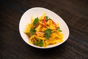 Papaya Salad

Fresh papaya in an orange gochugaru vinaigrette, tossed with house-pickled jalapeno and crushed peanuts at Saffron in Las Vegas