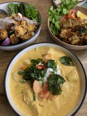 Yellow curry, thai arancinni balls, pad thai  at Vega Cafe in Vologda