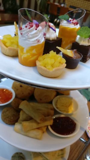 2 hot drinks per person and 3 platters to share with savoury treats and pastries. at Hectors Restaurant in Auckland