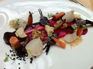 Macadamia cheese and poached baby vegetable salad: Beet paint, dates, dehydrated black olive, celeriac flakes  at Hectors Restaurant in Auckland