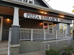 outside at Pizza Research Institute in Eugene