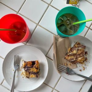 Biscoff blondie & lemon and blueberry cake   at Compassionate Kitchen in Morley