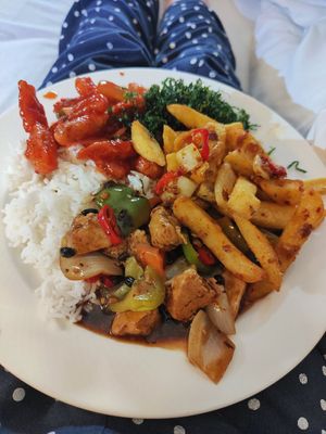 Vegan chicken black bean, crispy chilli vegan beef, salt and pepper chips, crispy seaweed and boiled rice at Woks Bar and Restaurant in Brandon