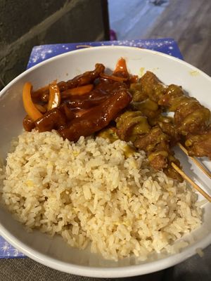 Vegan crispy chilli beef and vegan satay skewers  at Woks Bar and Restaurant in Brandon