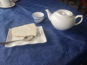 Vegan cheesecake with Chinese tea 🍵 at Woks Bar and Restaurant in Brandon